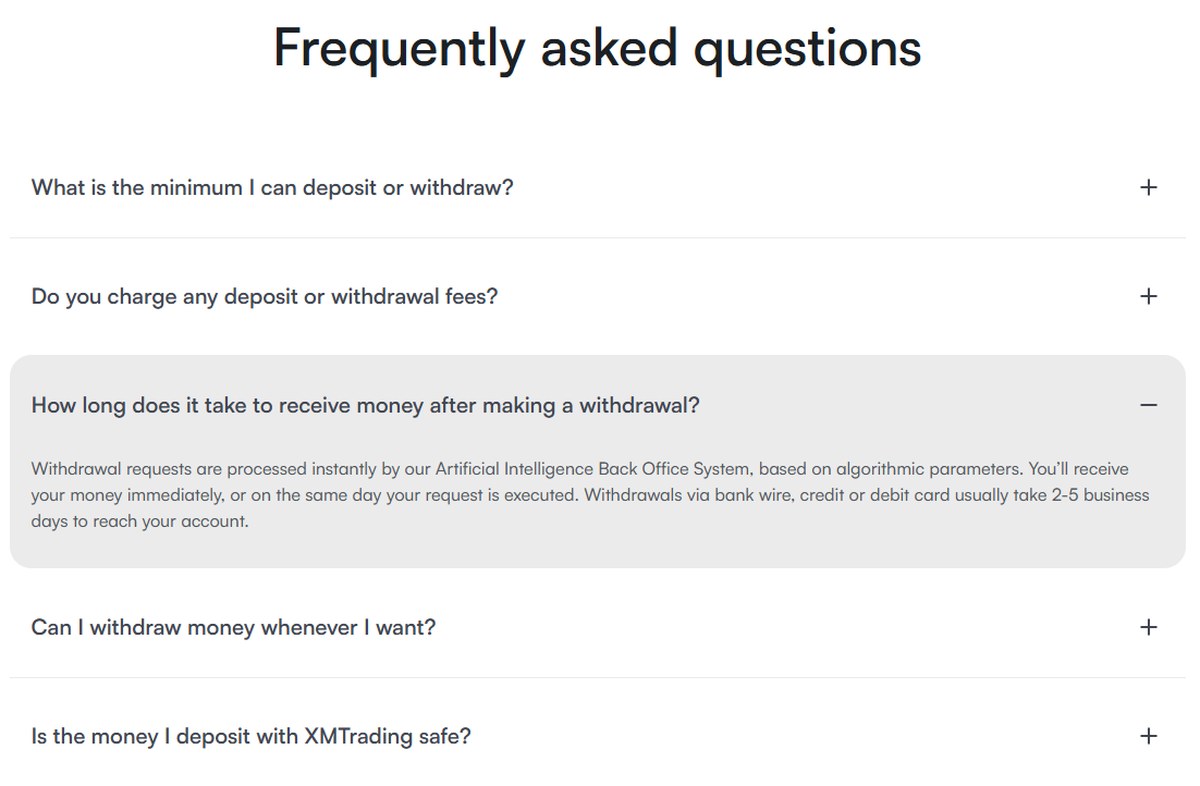 XMTrading withdrawal FAQ explaining the AI Back Office System and banking timelines